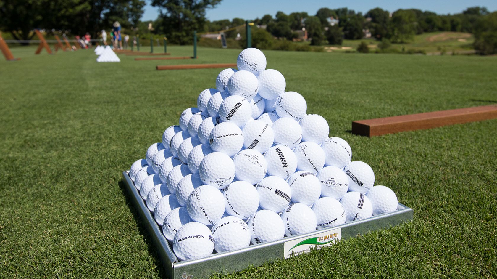 golf balls stacked in a pyramid