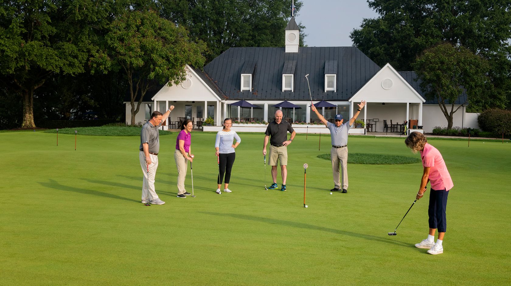 Group of people on putting green