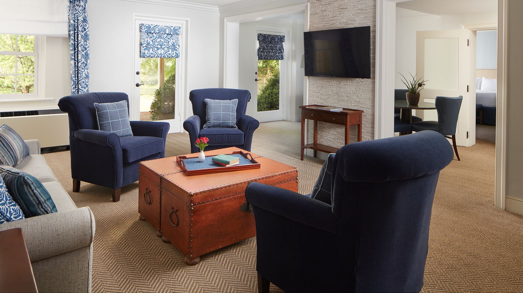 A Living Room With Blue Chairs